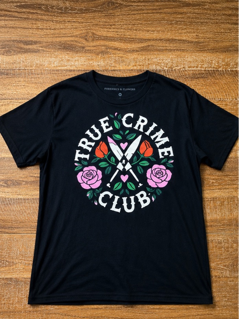 Forensics & Flowers True Crime Club Graphic Tee Black Floral Size M Unisex